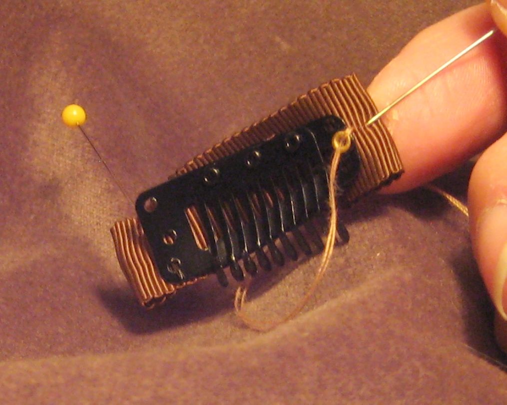 Sew fascinator clips to a piece of gros grain first.