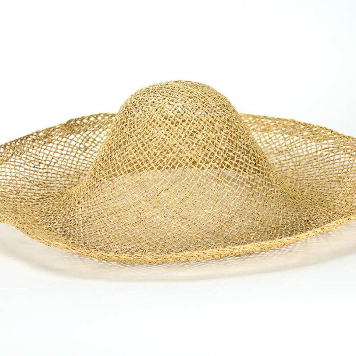 Loosely woven twisted natural raffia straw in 17/18 inch diameter.