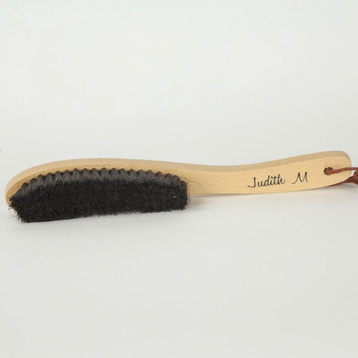 Soft Bristled brush with handle for use on brim or crown of hats.