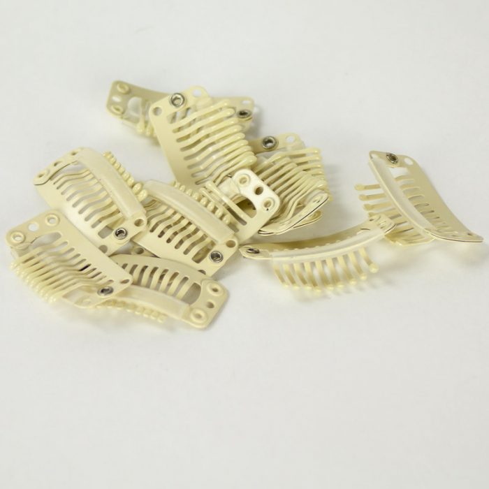 A small snap clip, Use in securing fascinators and smaller size hats to your hair.