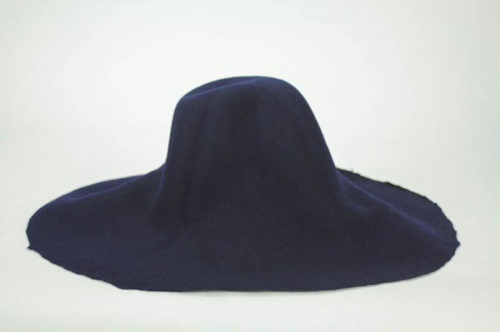 Navy blue capeline, 100% merino wool felt, made in US.