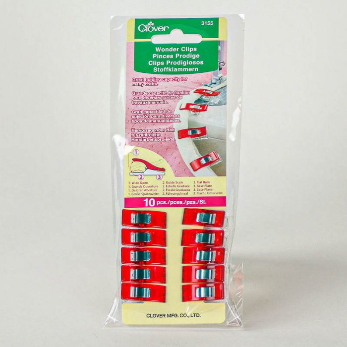 Durable plastic clip with steel spring. Similar to a clothespin but stronger.