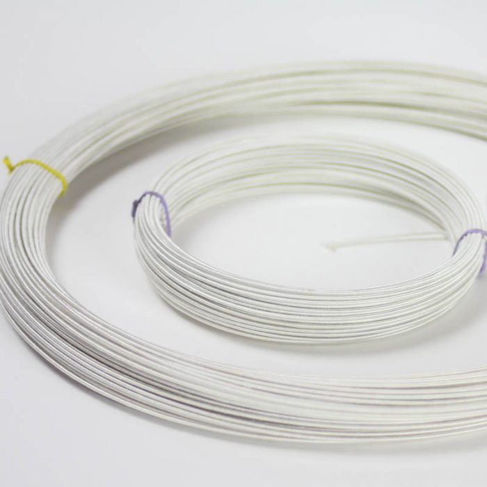 Rayon covered wire in white, #21 gauge (.71 mm) Used mostly in reinforcing hat brims and creating shapes and frames.