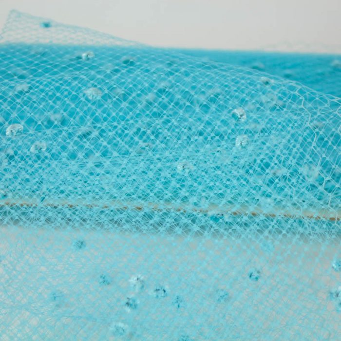 Turquoise Standard diamond pattern with 1/4 inch opening and chenille dots, 8-9 inch width, 100% nylon.