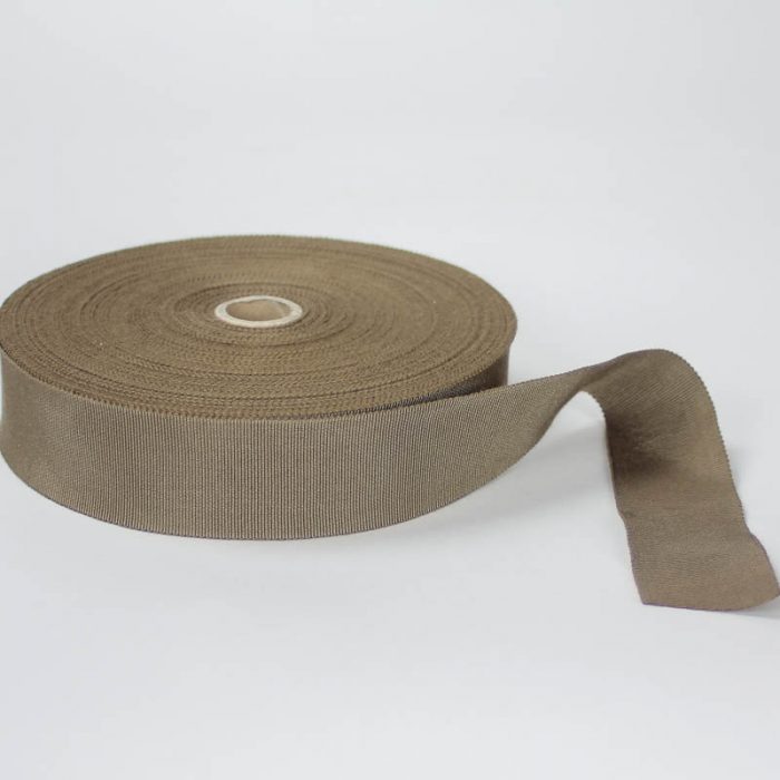 Taupe Brown. Made in France. Blend of 44% rayon/ 56% cotton grosgrain belting with a saw-tooth edge.