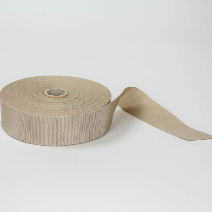 Beige. Made in France. Blend of 44% rayon/ 56% cotton grosgrain belting with a saw-tooth edge.