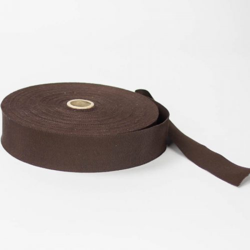 Dark Brown. Made in France. Blend of 44% rayon/ 56% cotton grosgrain belting with a saw-tooth edge.