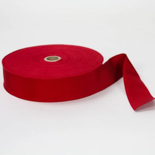 Berry Red. Made in France. Blend of 44% rayon/ 56% cotton grosgrain belting with a saw-tooth edge.