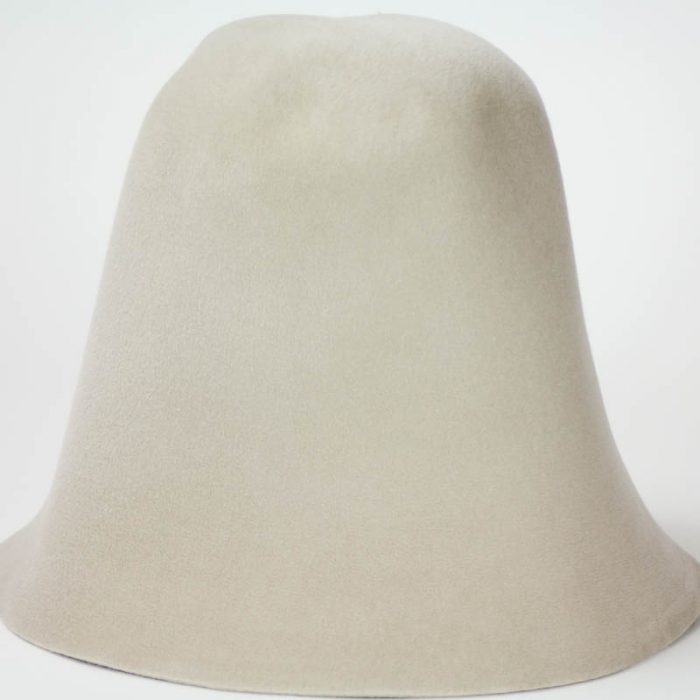 Light Beige hood , or cone shape, with velour finish on outside only. Plush velour velvet look on outer side.