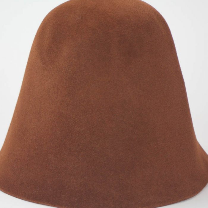Spice brown hood, or cone shape, with velour finish on outside only.