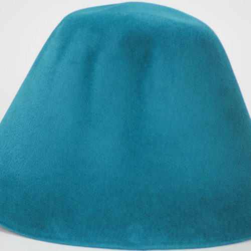 Peacock teal hood, or cone shape, with velour finish on outside only.