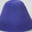 A bright blue hood, or cone shape, with velour finish on outside only.