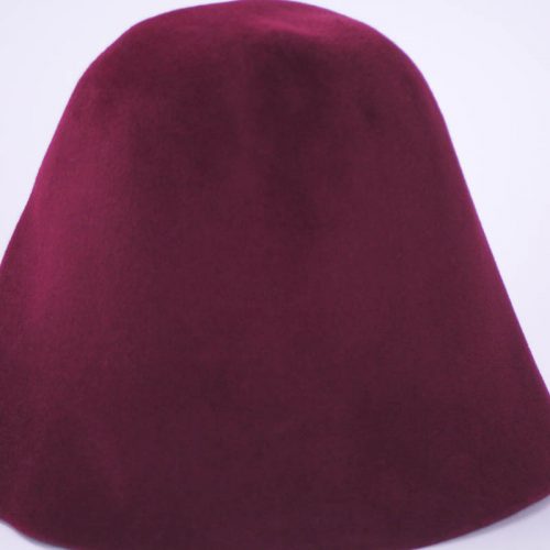 Burgundy wine hood, or cone shape, with velour finish on outside only.