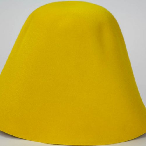 Bright yellow hood, or cone shape, with velour finish on outside only.