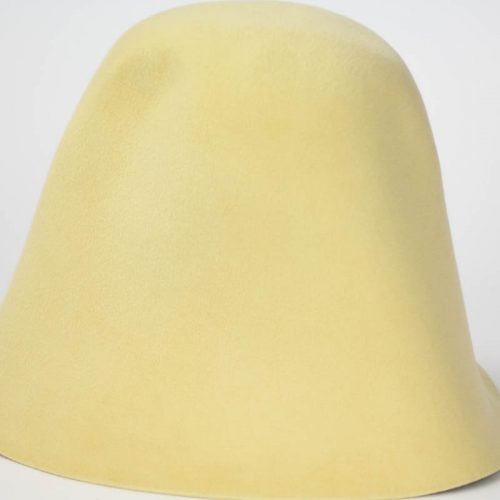Pastel Yellow hood, or cone shape, with velour finish on outside only.