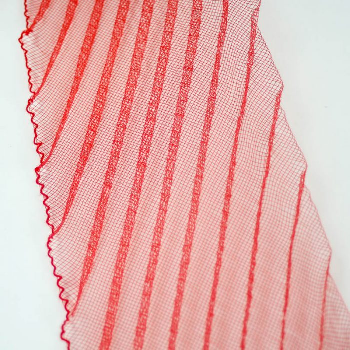 A pleated horsehair with 1/2 inch pleating running through, on diagonal to width.
