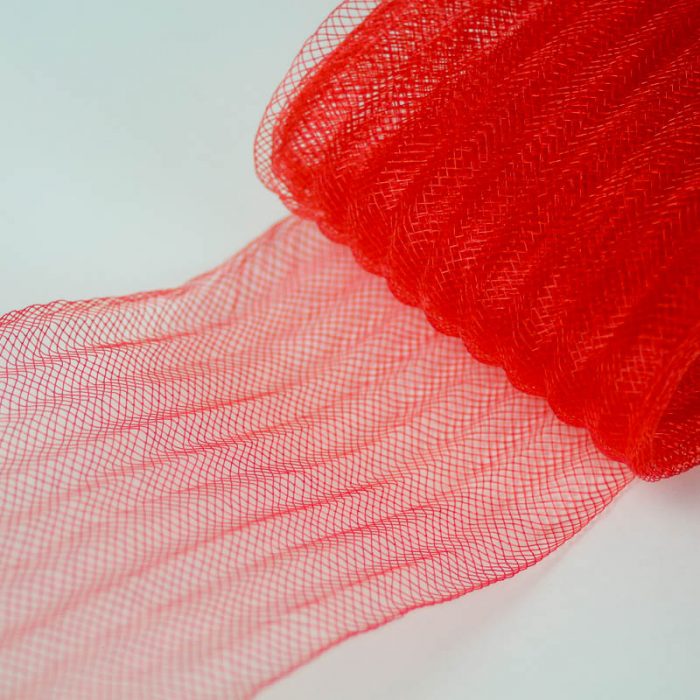 Red pleated horsehair with 1/4 inch pleating running through, parallel to length.