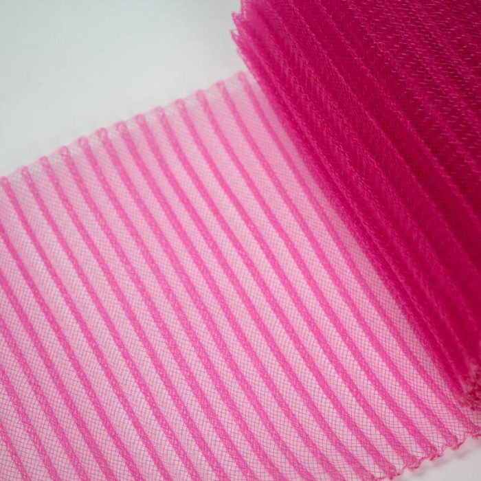 Hot Pink polyester, very flexible, 1/4 inch pleats.