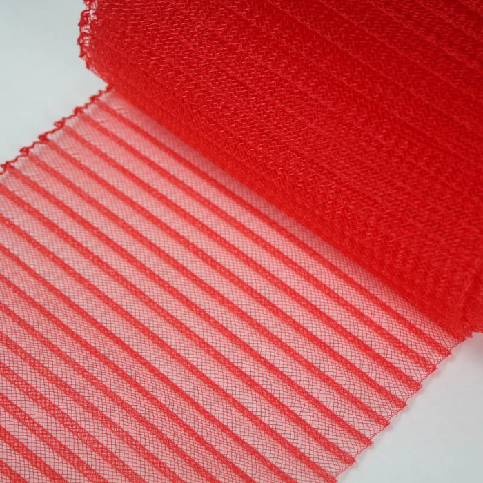 Red polyester, very flexible, 1/4 inch pleats.