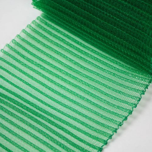 Emerald Green polyester, very flexible, 1/4 inch pleats.