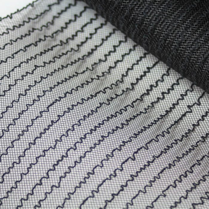 Black horsehair with a cotton thread runs every half inch for gathering purposes.