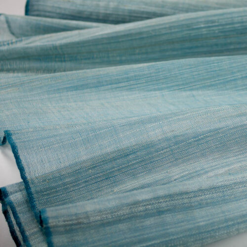 Teal/Turquoise Abaca woven with polyester thread.